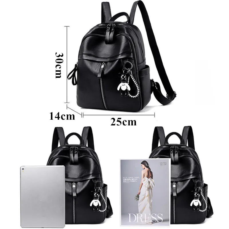 Ryggsäck i läder - dam svart storleksjämförelse